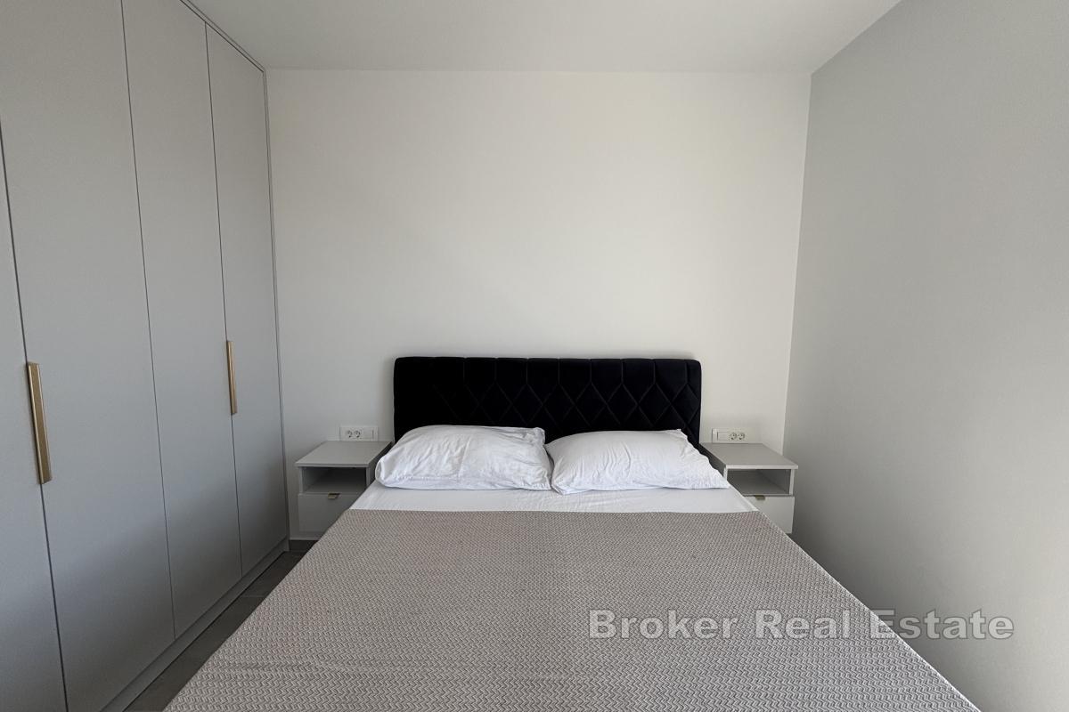 Ekstraordinær toppleilighet med takterrasse nær sjøen