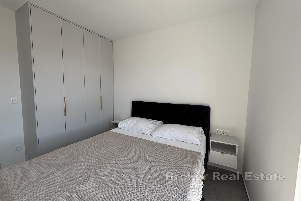 Ekstraordinær toppleilighet med takterrasse nær sjøen