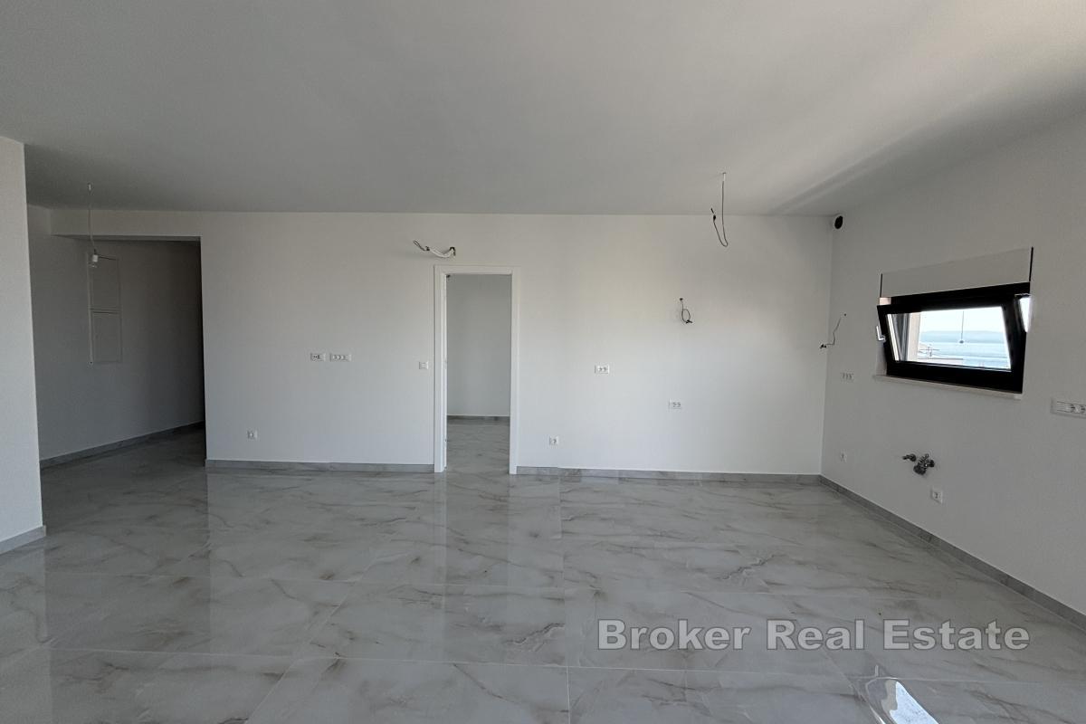 Toromsleilighet i nybygg med havutsikt