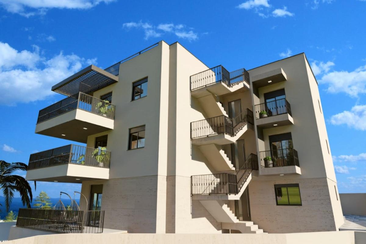 Appartement en attique dans un immeuble neuf moderne