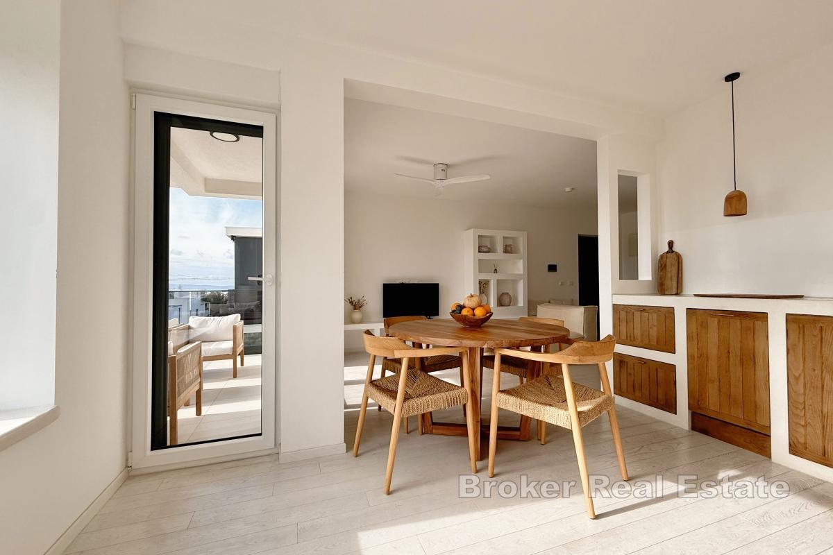 Neubau-Penthouse-Apartment mit zwei Zimmern und Meerblick