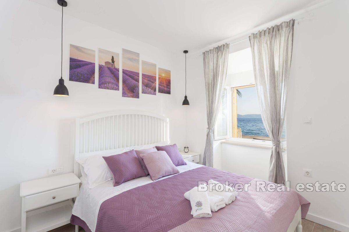 Stone house in the first row to the sea