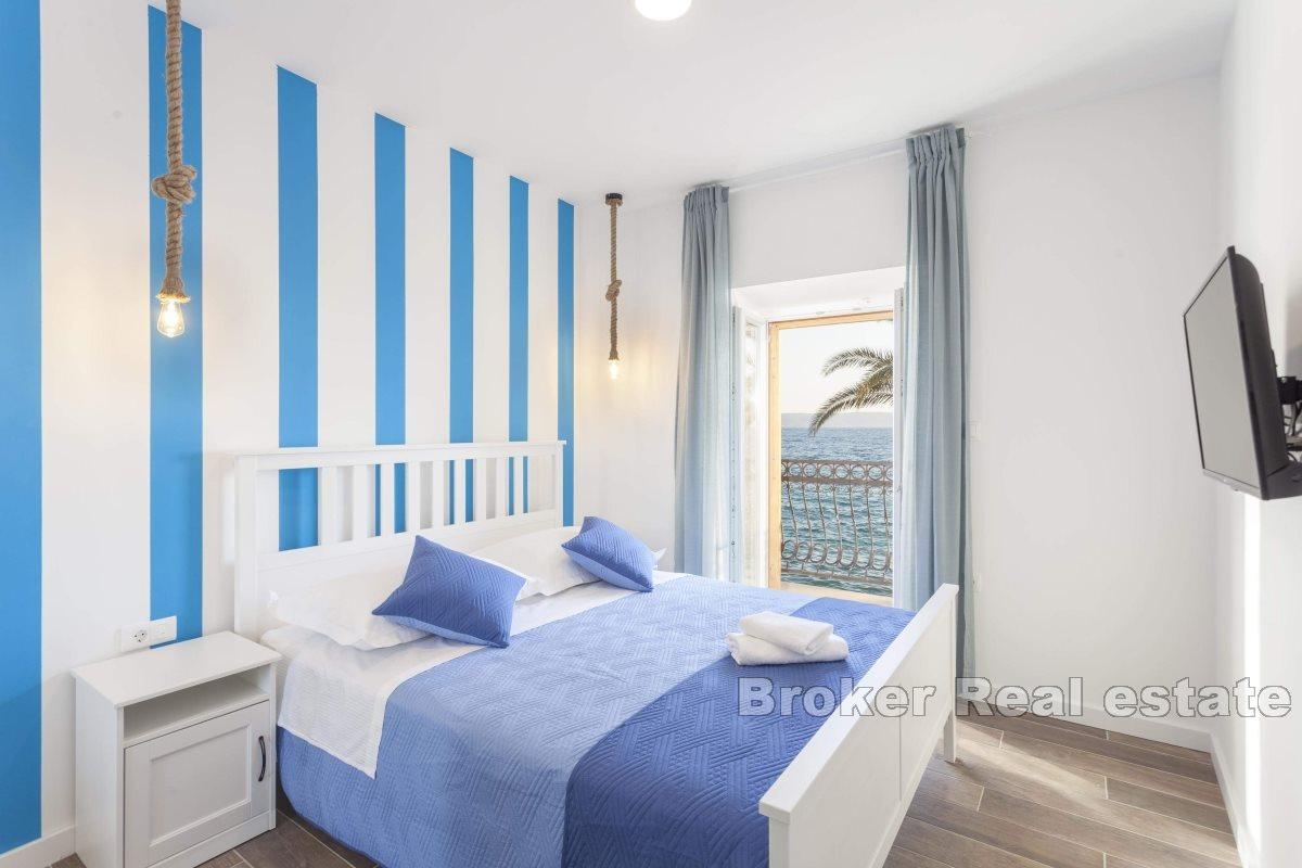 Stone house in the first row to the sea