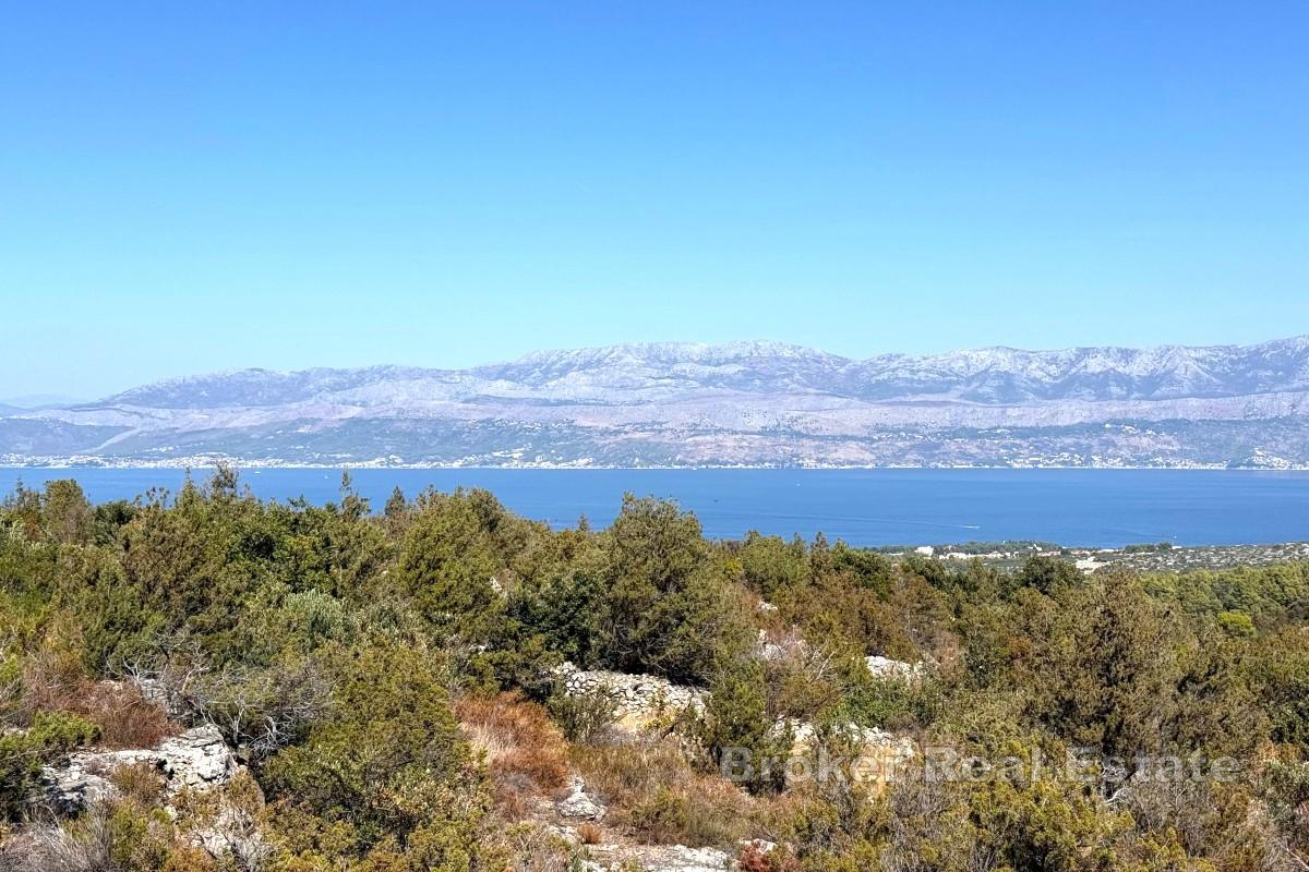 Stor tomt med panoramautsikt över havet