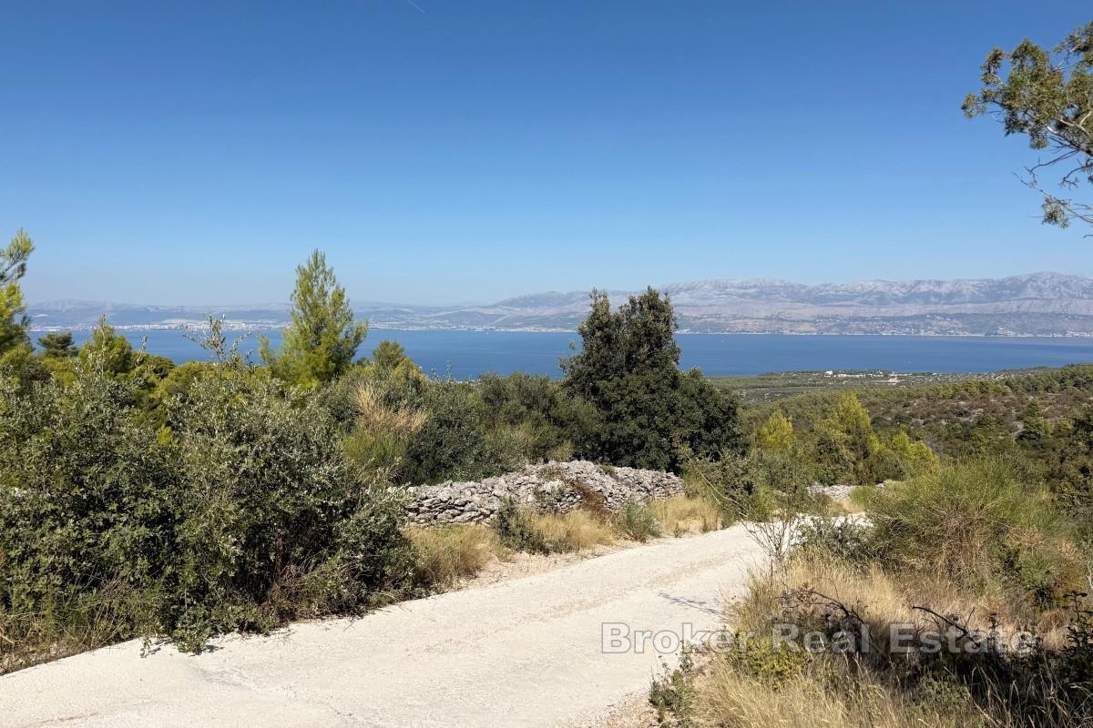 Stor tomt med panoramautsikt över havet