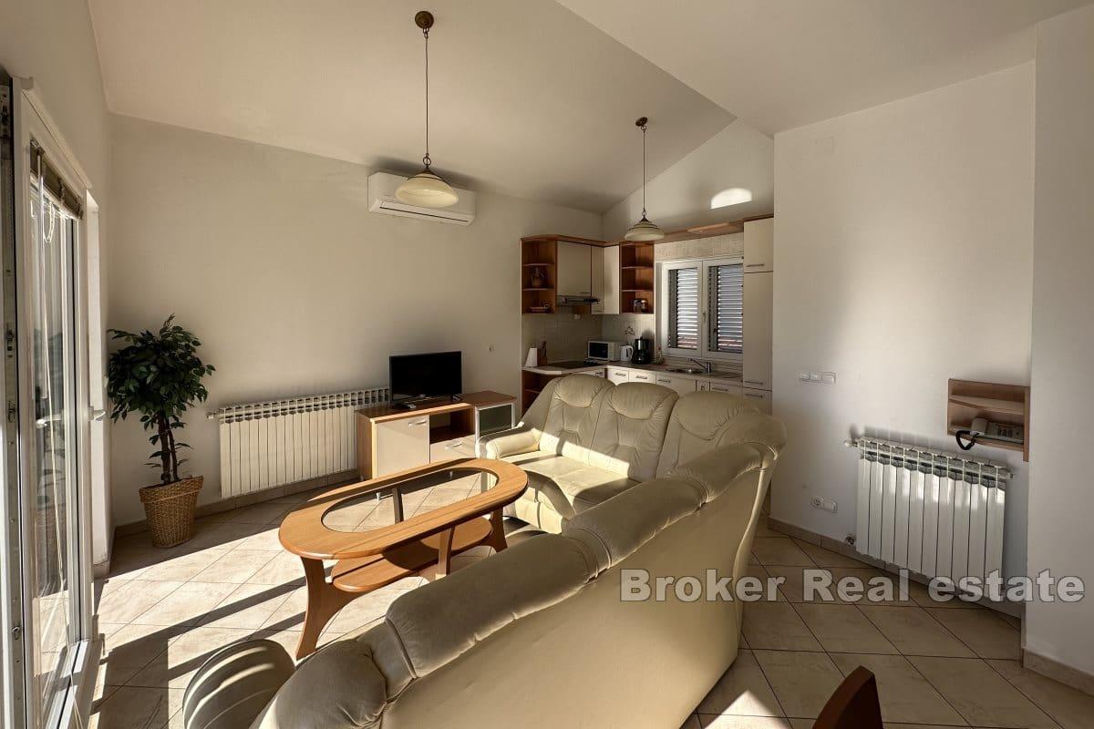 Dům s apartmány v první řadě k moři