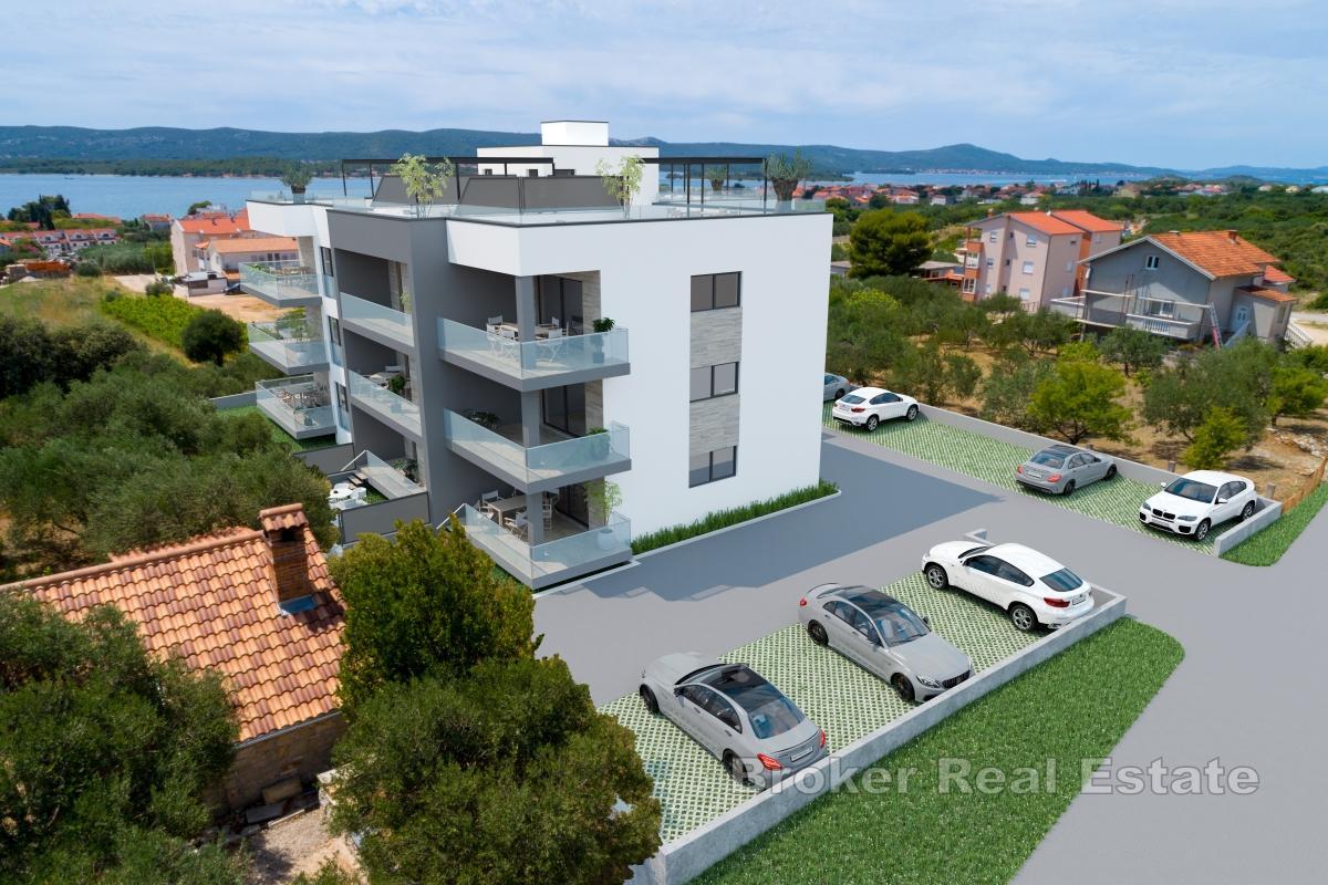 Appartement moderne dans un nouvel immeuble avec vue sur la mer