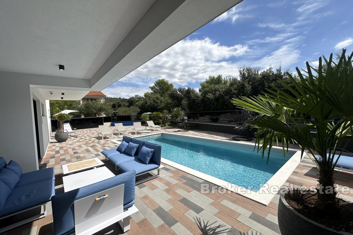 luxury villa with an unobstructed view of the sea