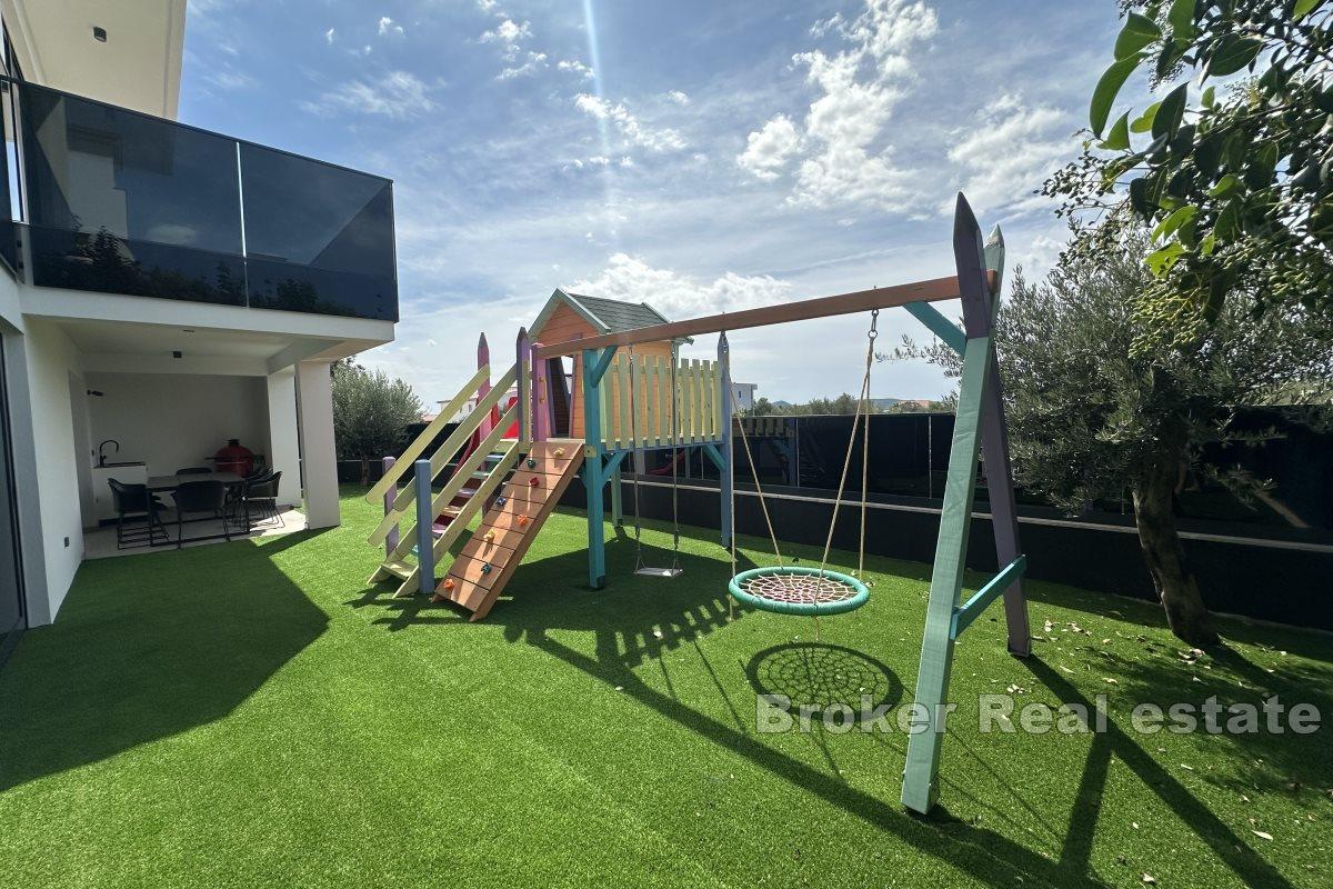 luxury villa with an unobstructed view of the sea