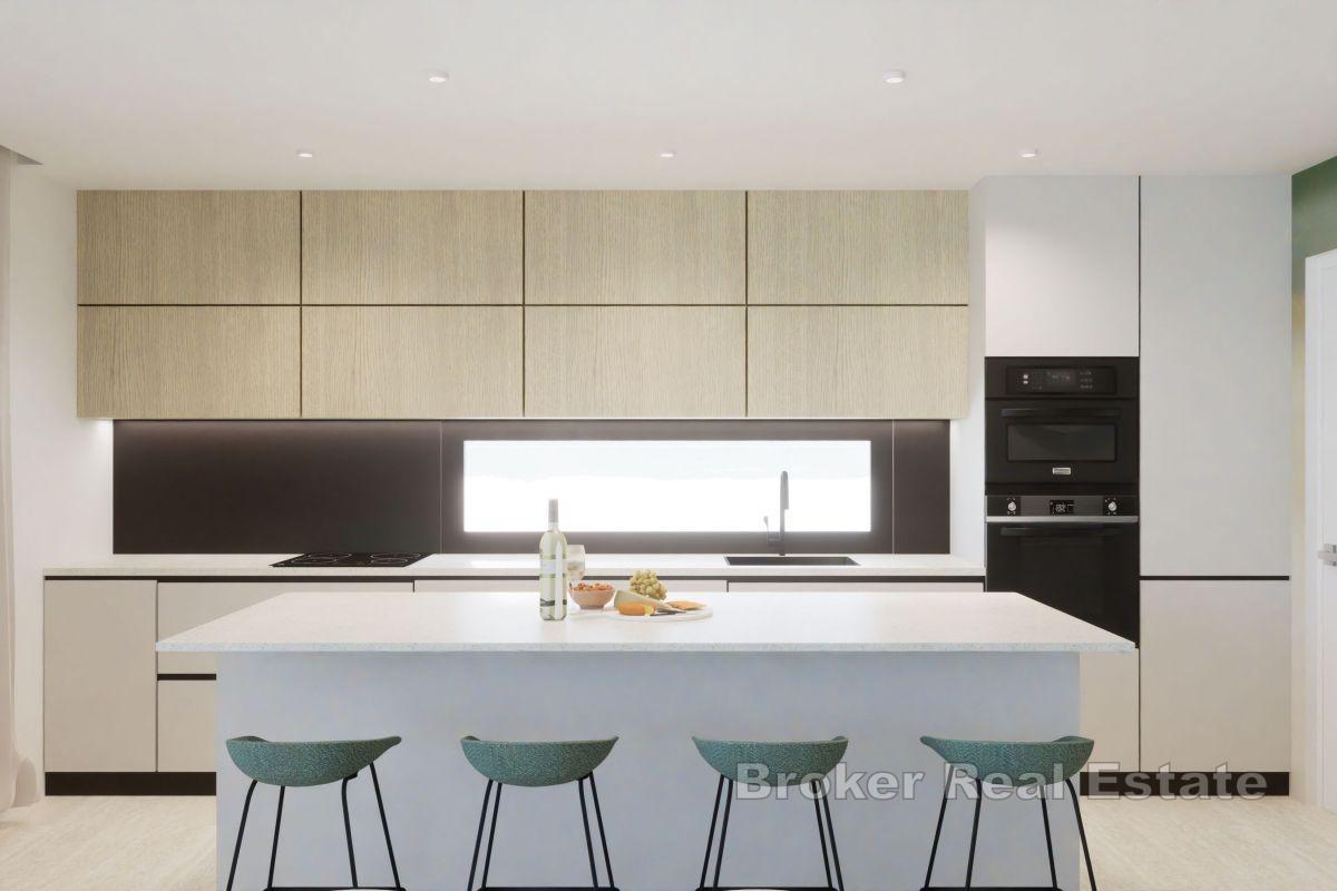 Современные апартаменты с бассейном в первом ряду от моря