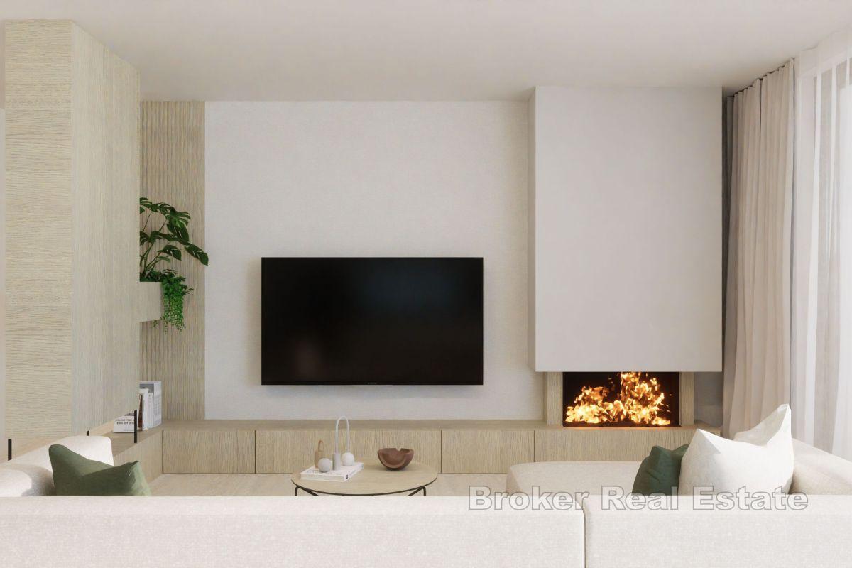 Современные апартаменты с бассейном в первом ряду от моря