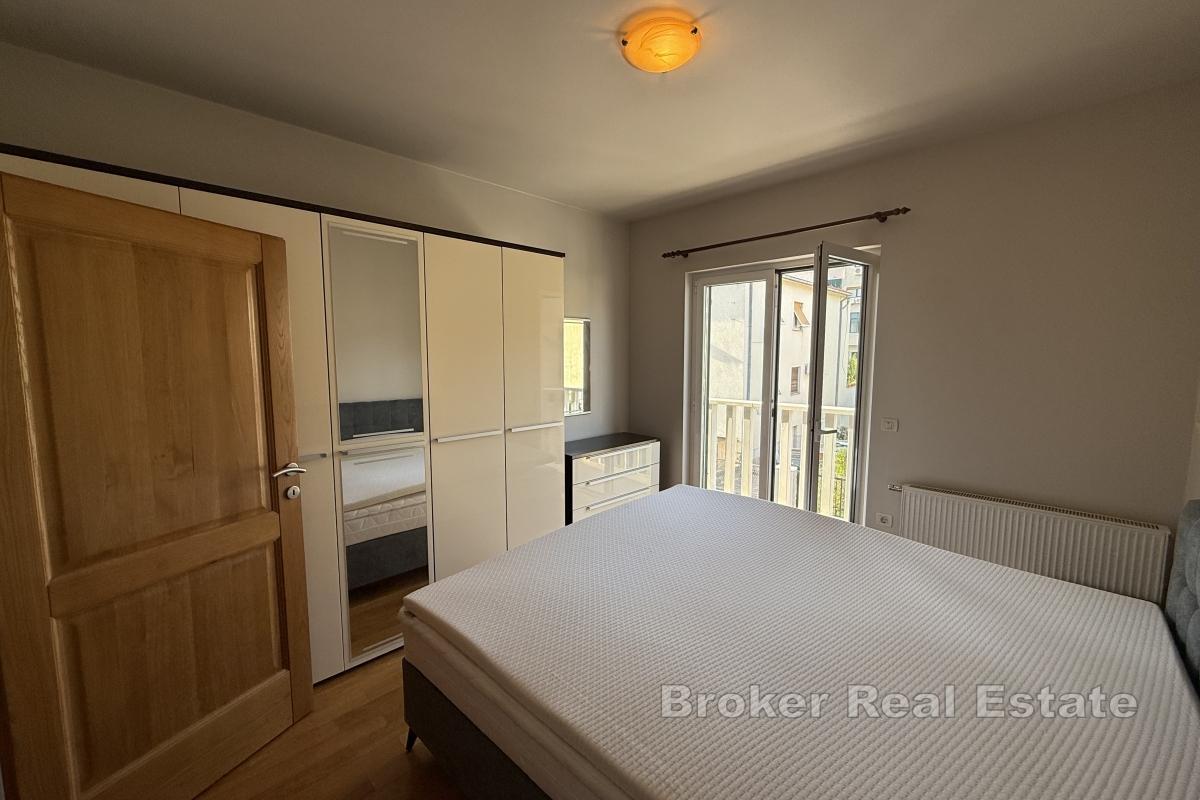 Jednopokojový byt s parkováním a balkonem