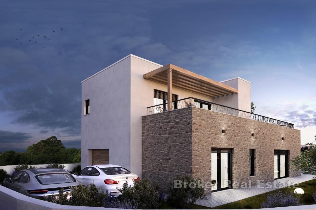 Maison familiale de trois chambres avec garage