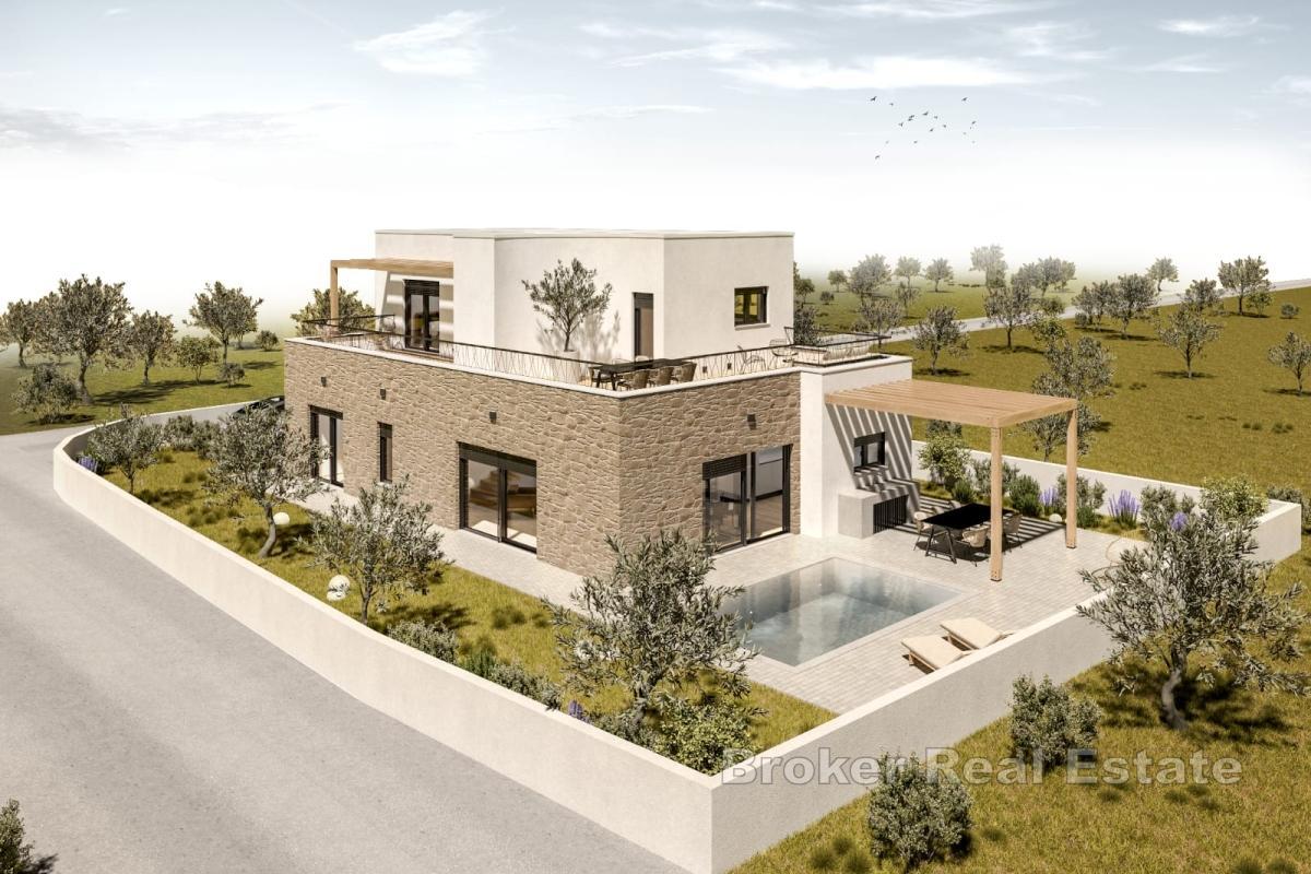 Maison familiale de trois chambres avec garage