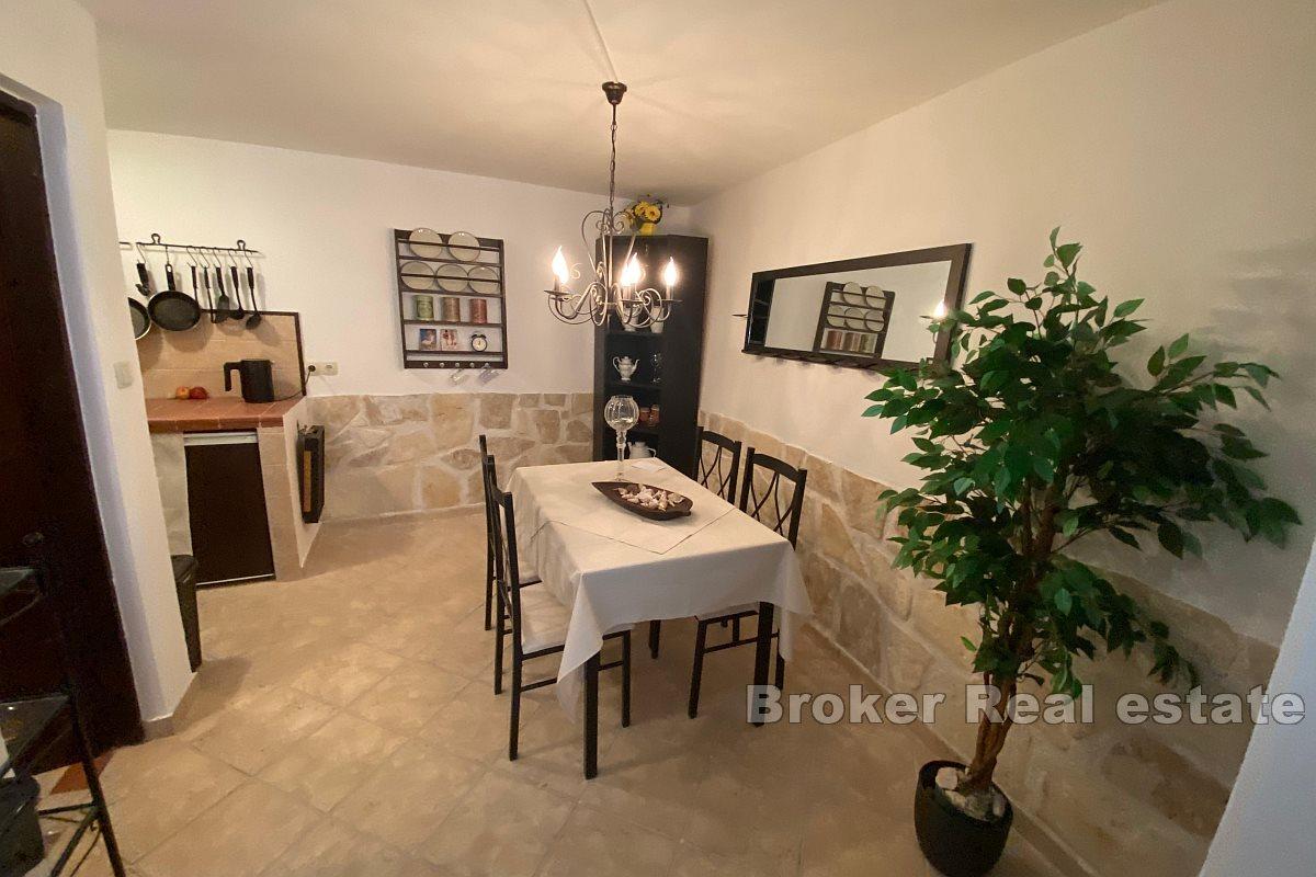 Semi-detached house with a roof terrace and a view of the harbor