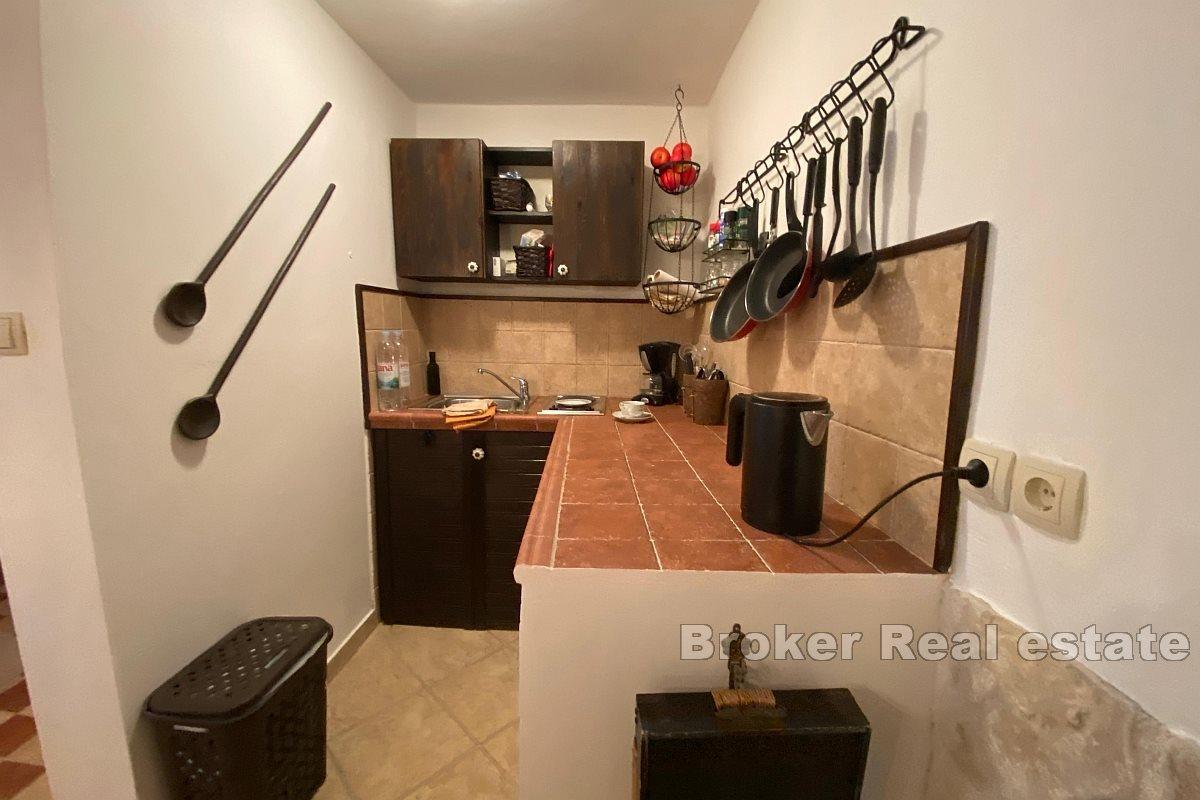 Semi-detached house with a roof terrace and a view of the harbor