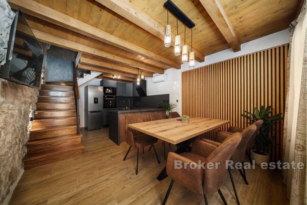 Stone house in the center of a small town with beautiful view on the bay