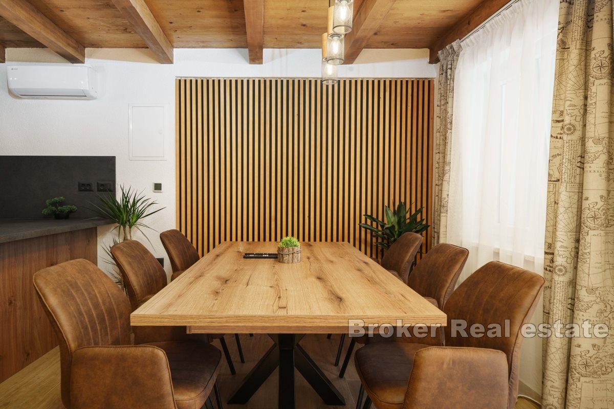 Stone house in the center of a small town with beautiful view on the bay