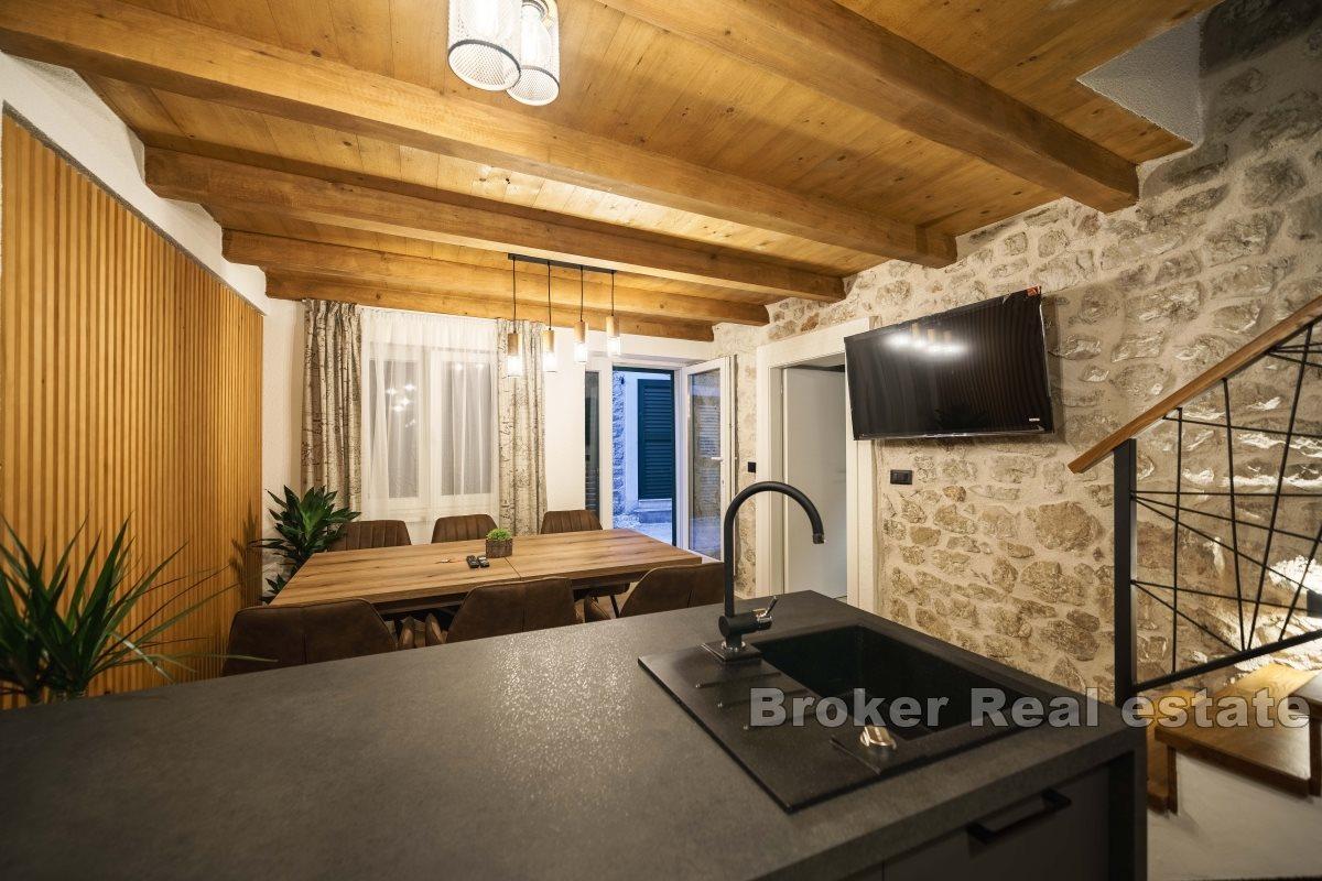 Stone house in the center of a small town with beautiful view on the bay