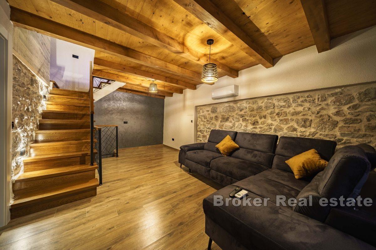 Stone house in the center of a small town with beautiful view on the bay