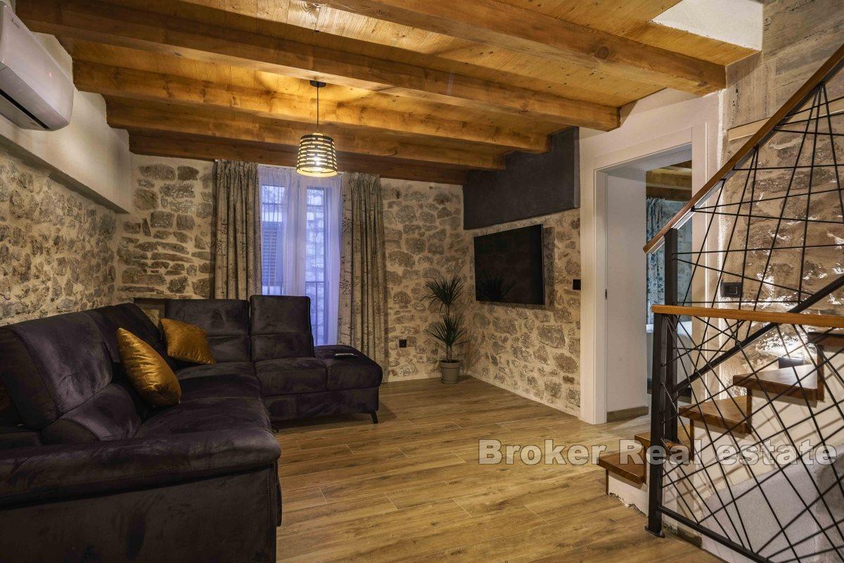 Stone house in the center of a small town with beautiful view on the bay