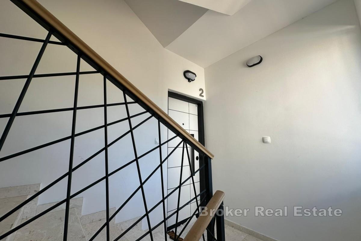 Toromsleilighet med parkeringsplass og havutsikt