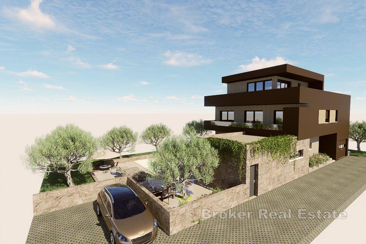 Tomt med prosjekt for villabygging nær sjøen