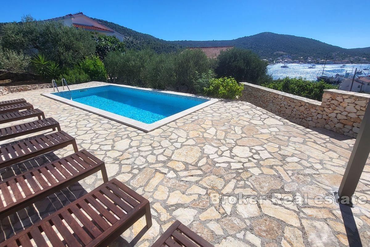 House with pool near the sea