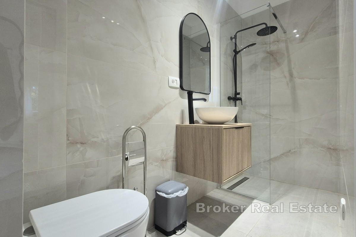 Dvosoban stan s vrtom u mirnom okruženju