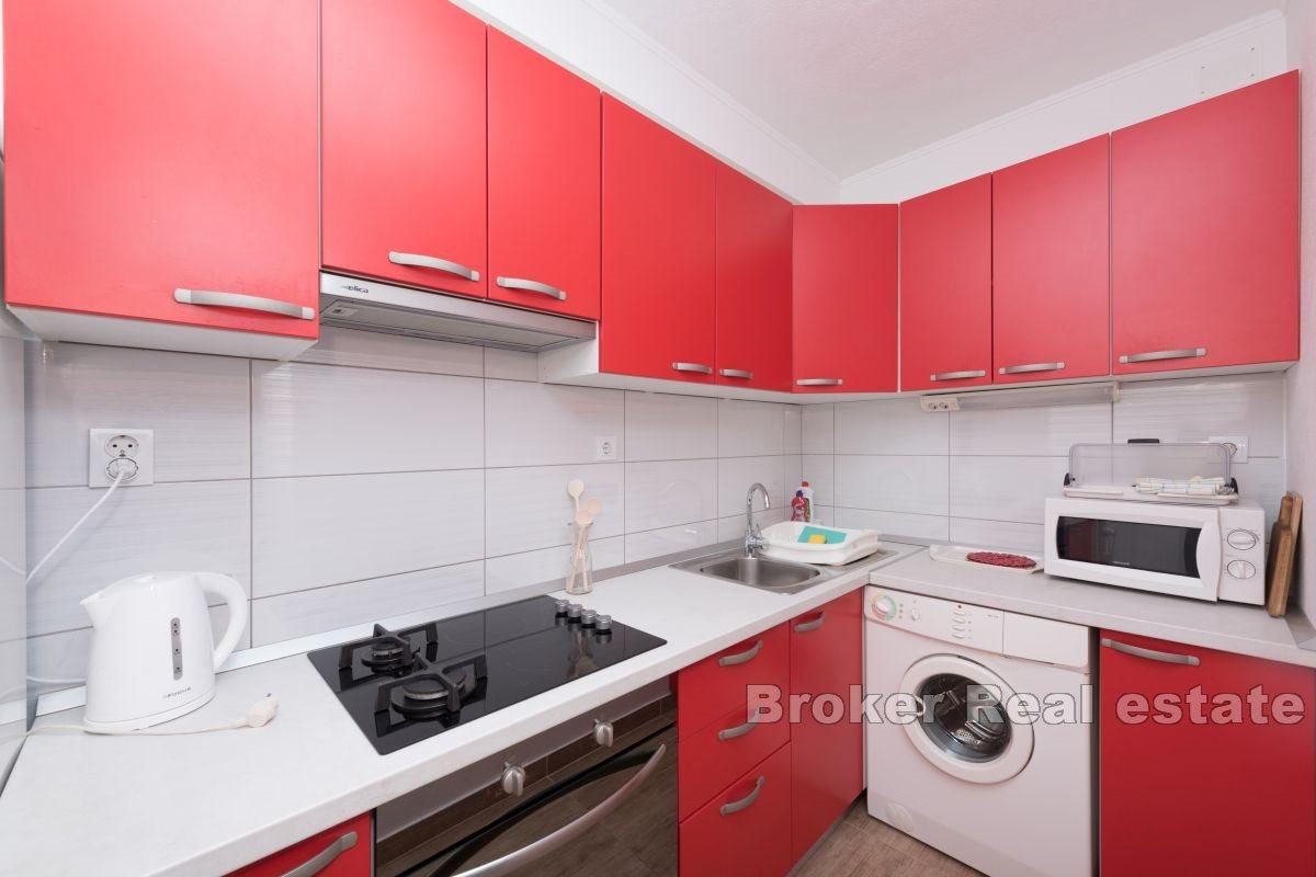 Leilighetshus nær stranden