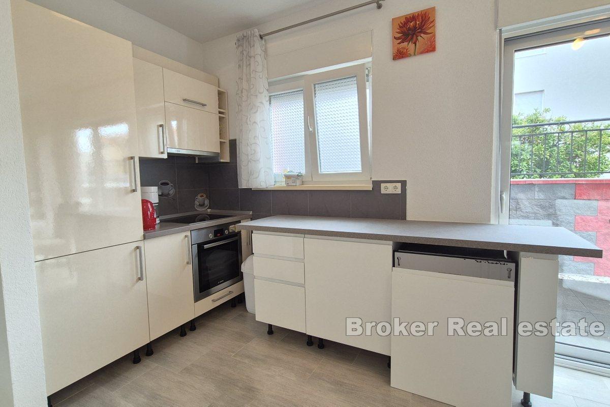 Appartement de deux chambres avec place de parking