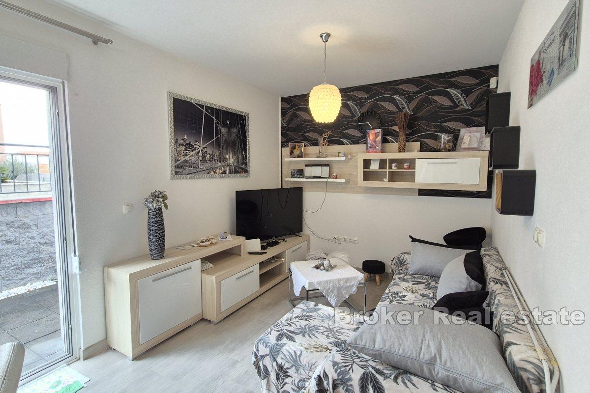 Appartement de deux chambres avec place de parking