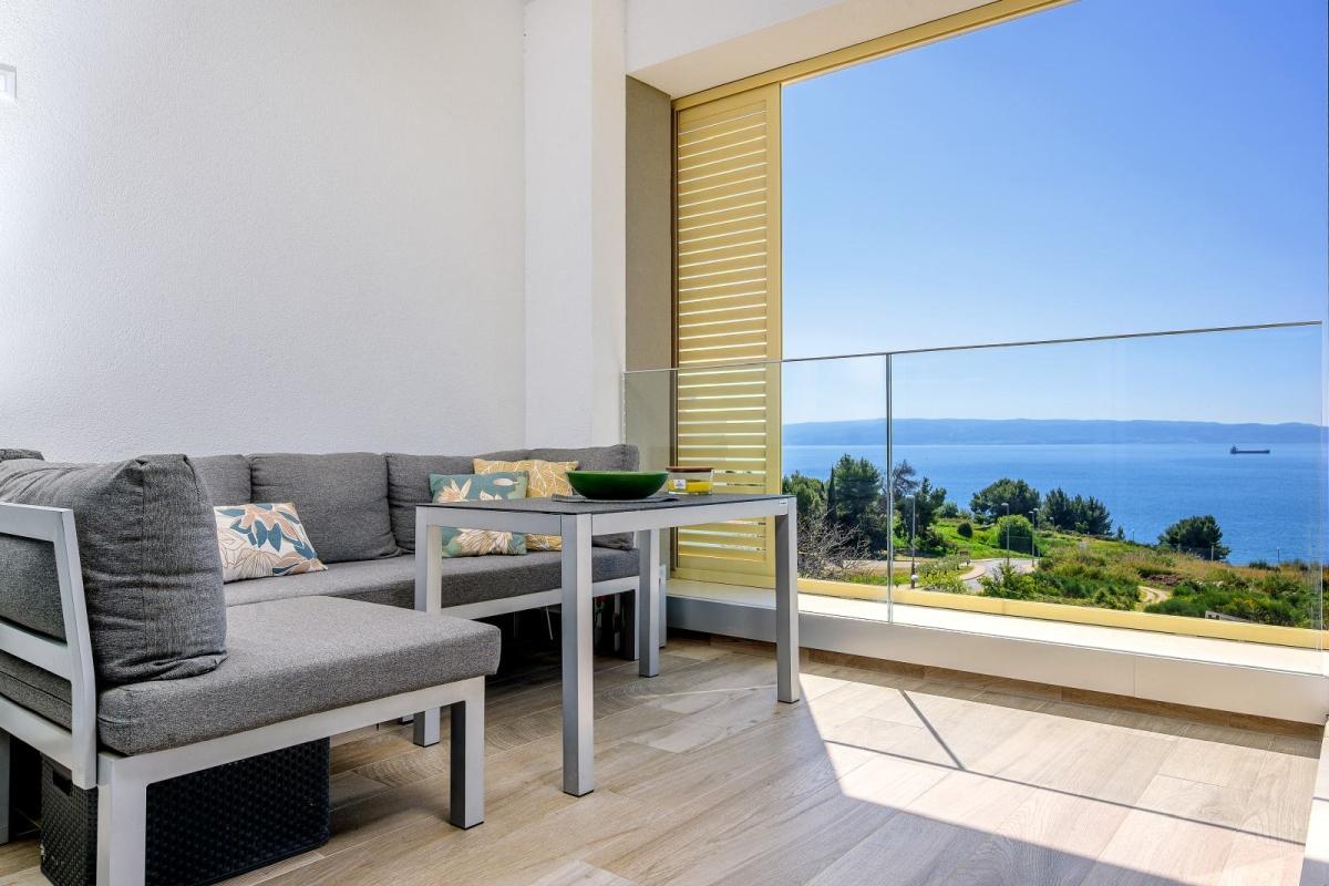 Elegancki apartament z trzema sypialniami, widokiem i garażem