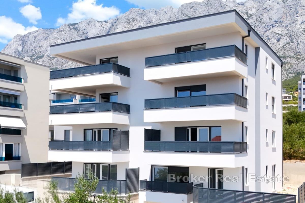 Appartamento con due camere da letto in un nuovo edificio con giardino