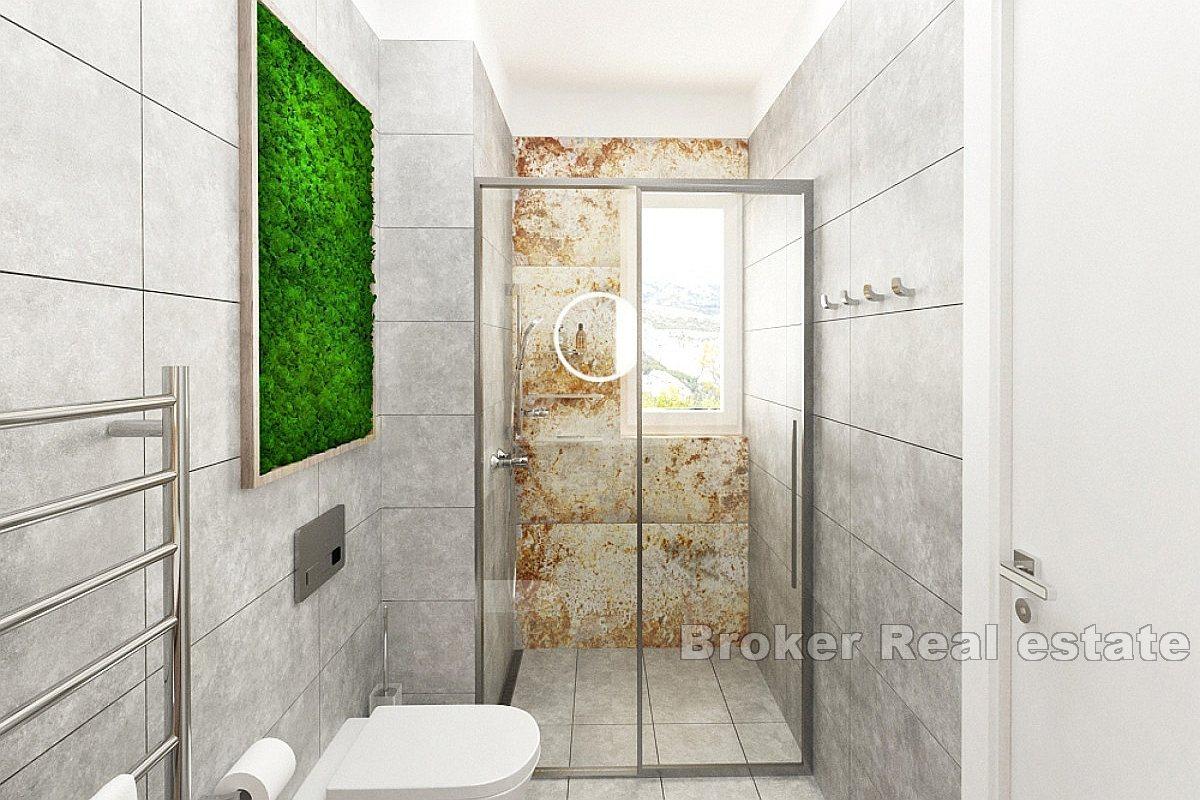 Modern apartments in a new building with a view of the Mediterranean coast