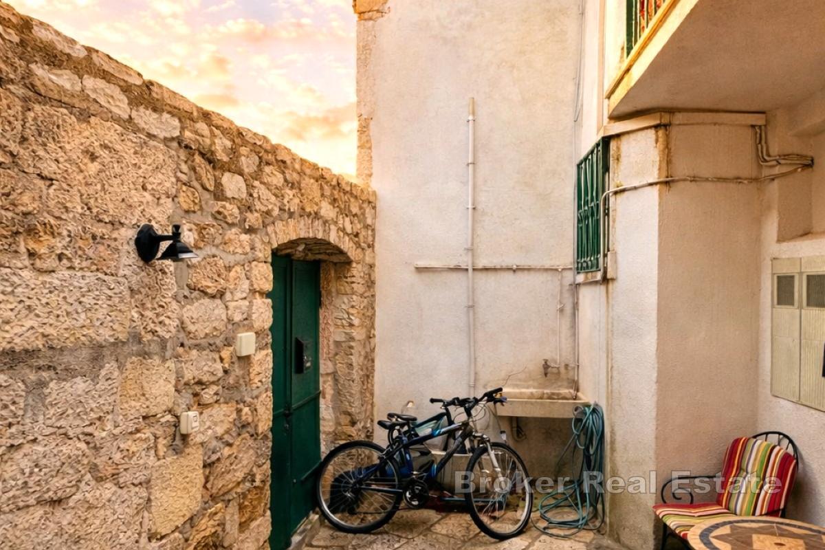 Unique stone property with 4 commercial units, family house and apartments