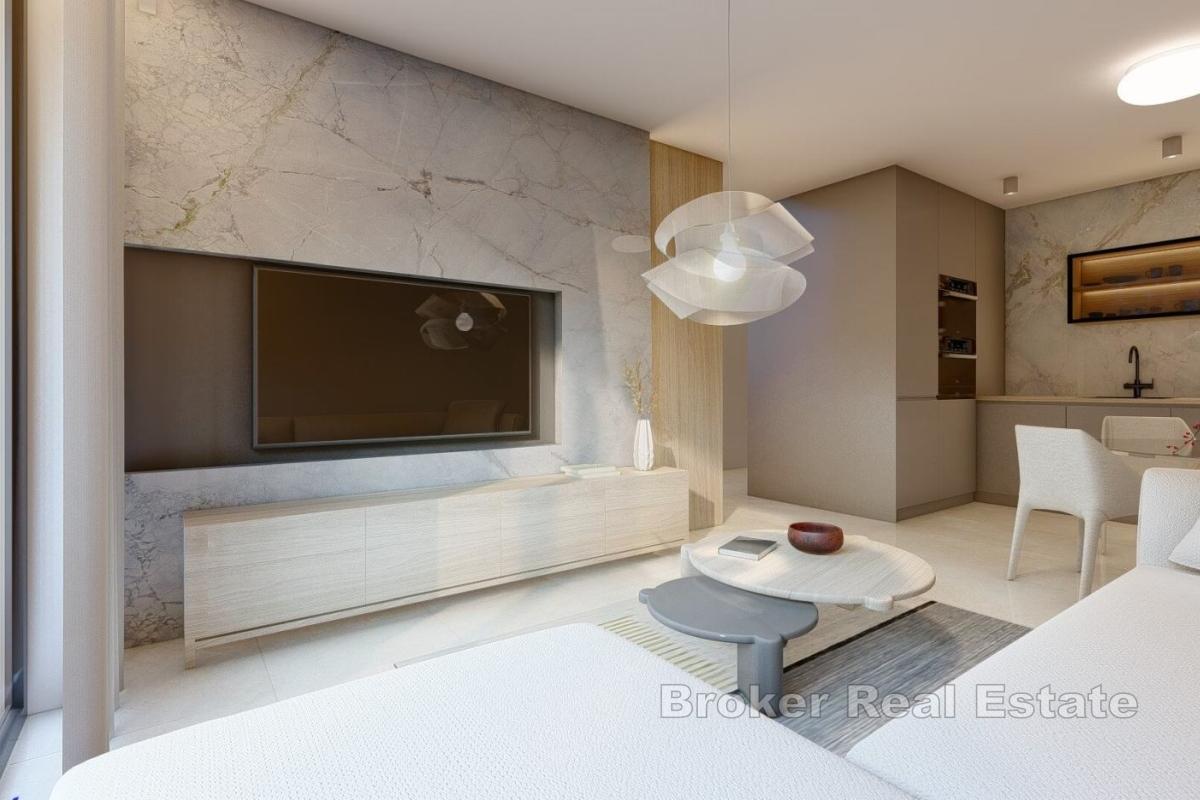 Moderno appartamento con due camere da letto in un nuovo edificio con vista parziale sulla costa