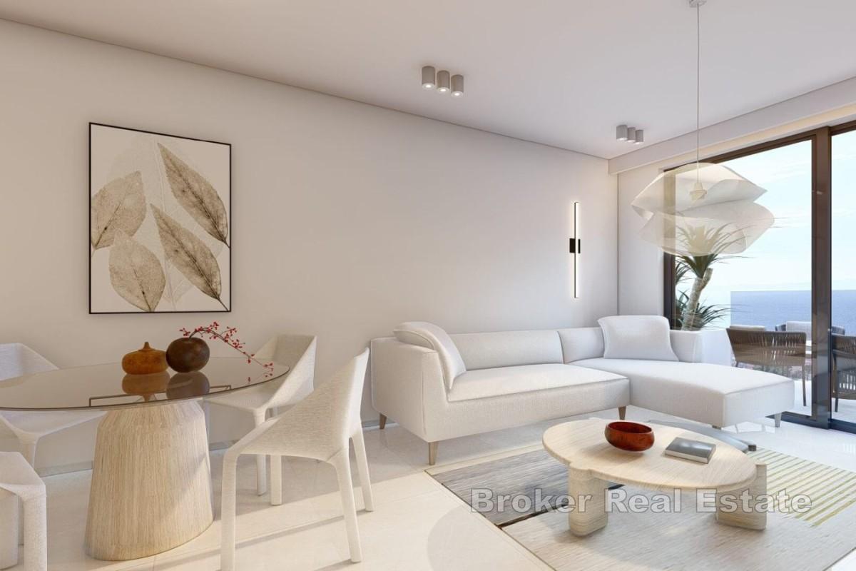 Moderno appartamento con due camere da letto in un nuovo edificio con vista parziale sulla costa