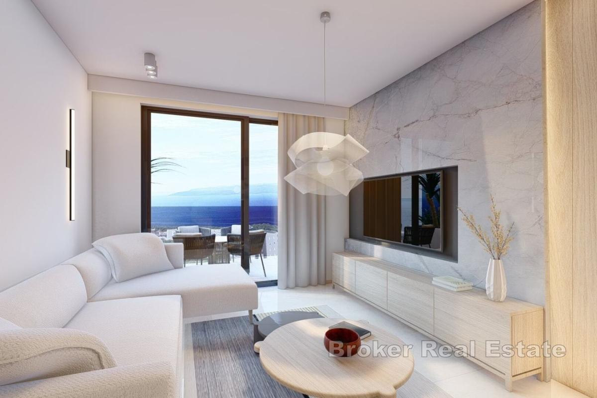 Moderno appartamento con due camere da letto in un nuovo edificio con vista parziale sulla costa