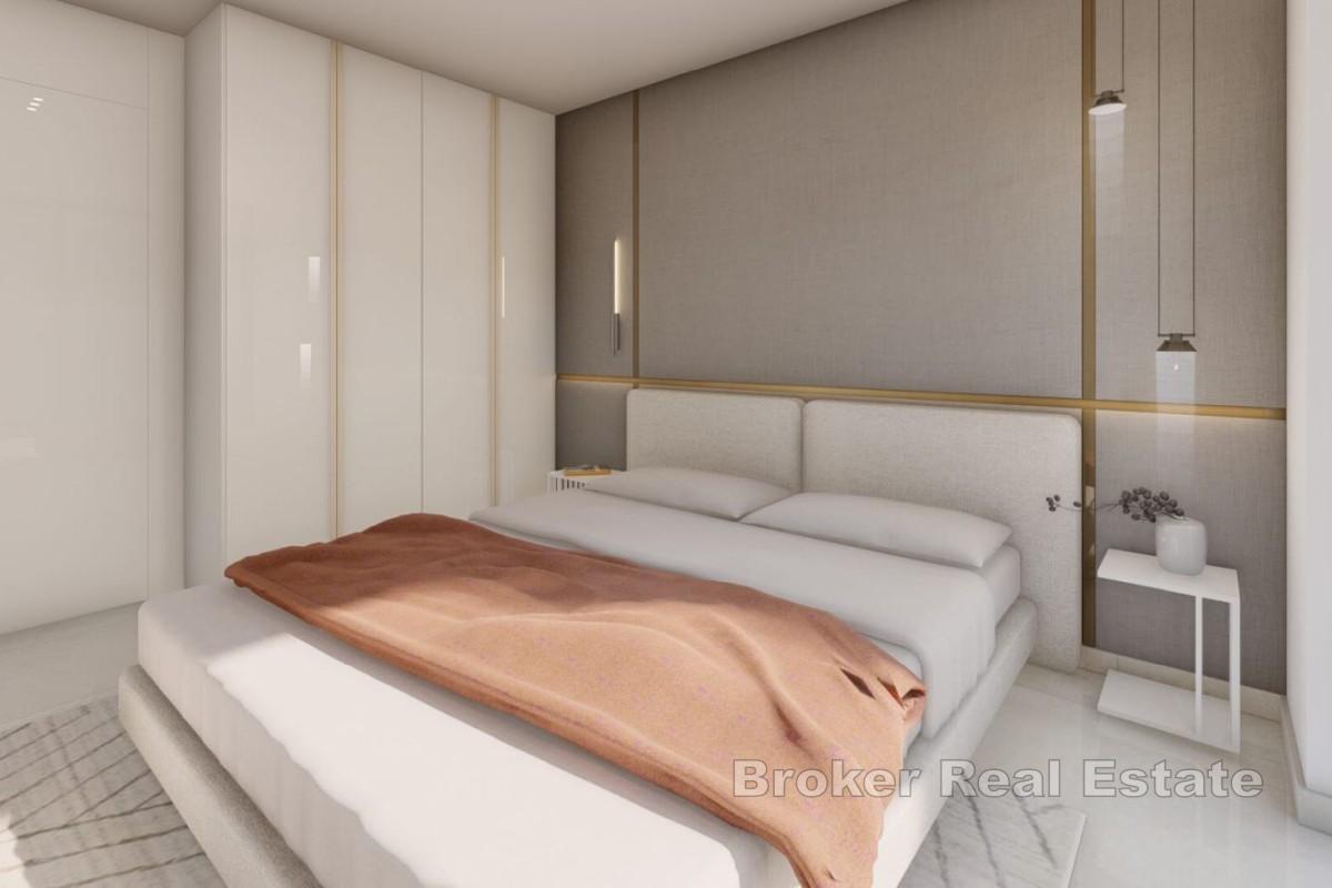 Moderno appartamento con due camere da letto in un nuovo edificio con vista parziale sulla costa