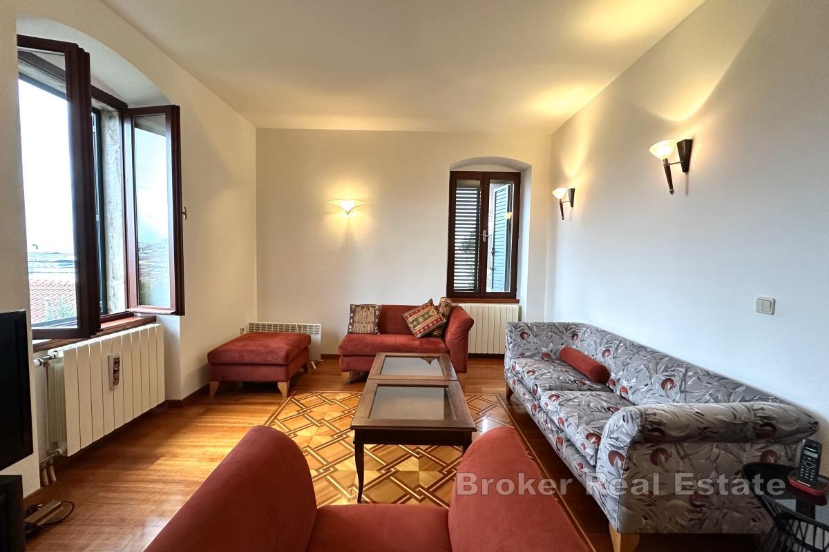 Eksklusiv leilighet i sentrum med hage og garasje