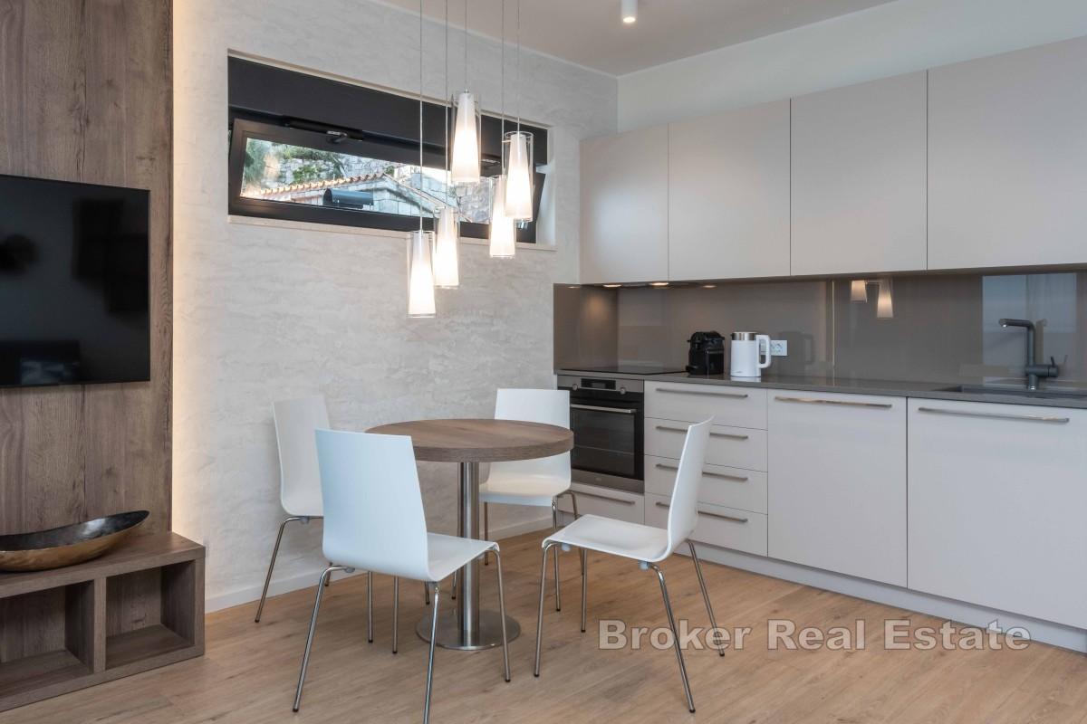 Vzdušný dvoupokojový byt se dvěma terasami a garáží v prestižní lokalitě