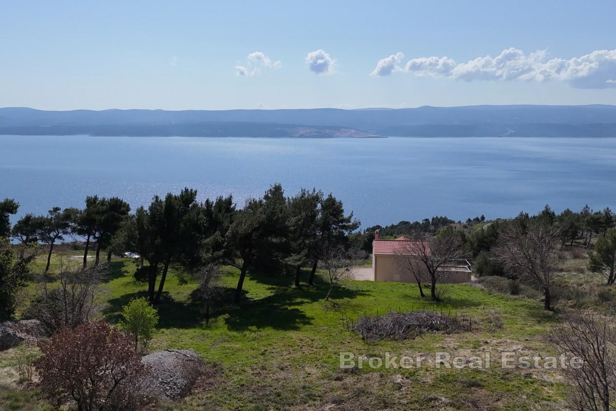 Tomt och hus med utsikt