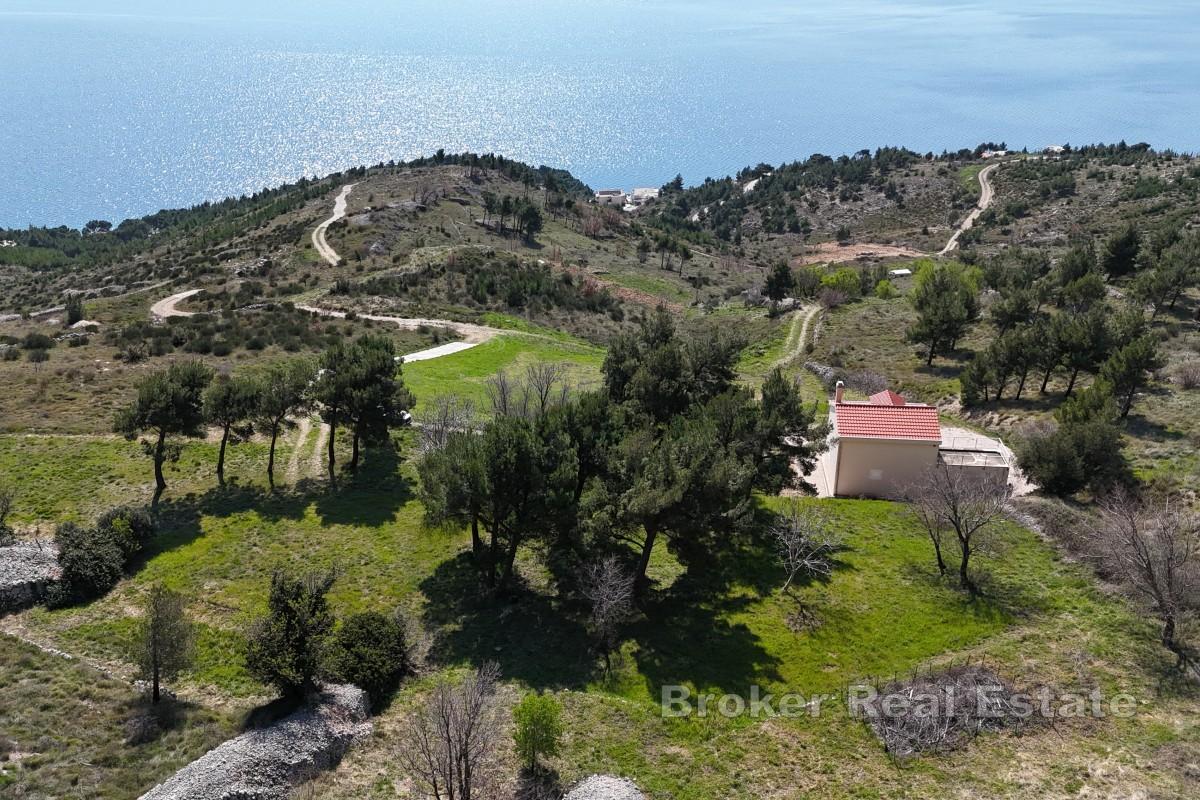 Terreno e casa con vista