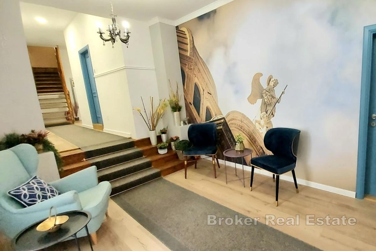 En boutiqueanläggning med 9 designerrum för den ultimata upplevelsen