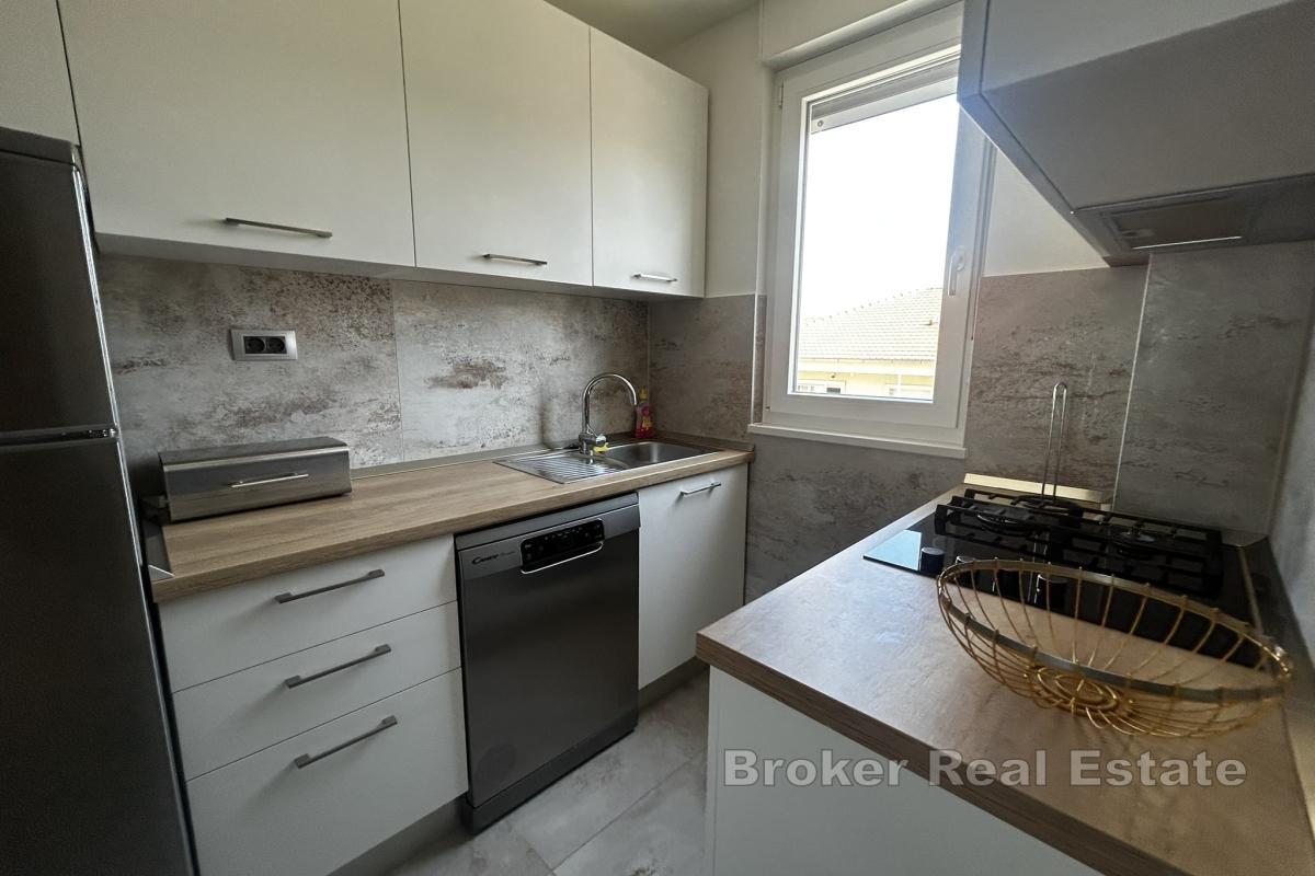 Appartement deux chambres lumineux et moderne avec balcon et garage à louer à long terme