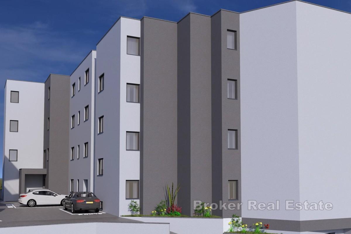 Prostorný dvoupokojový byt v přízemí novostavby