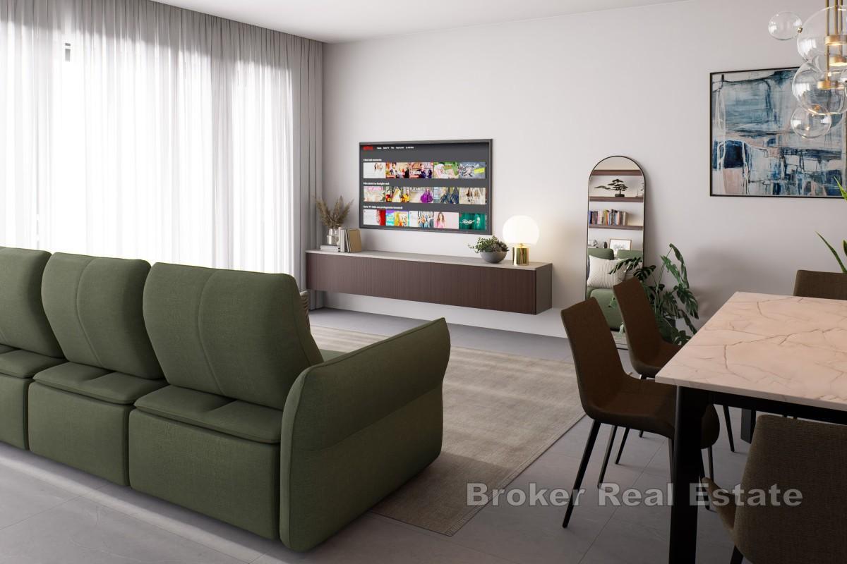 Modern lägenhet med privat trädgård