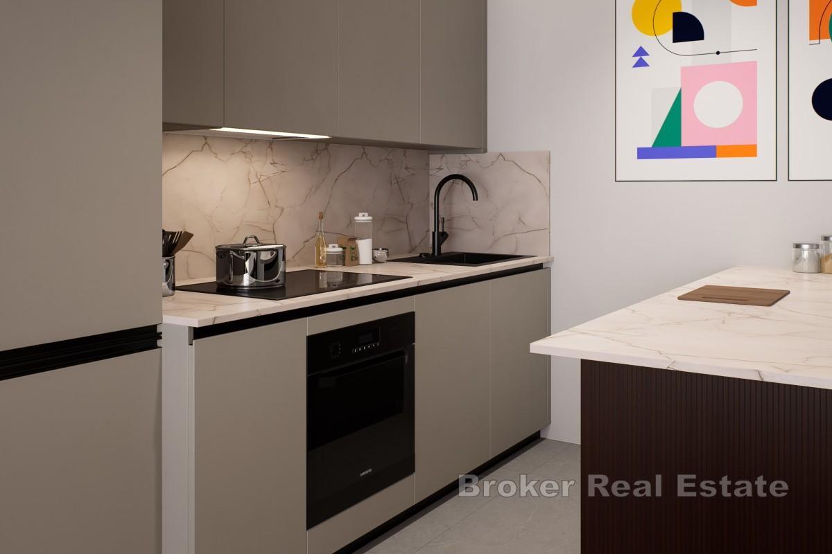 Modern lägenhet med privat trädgård