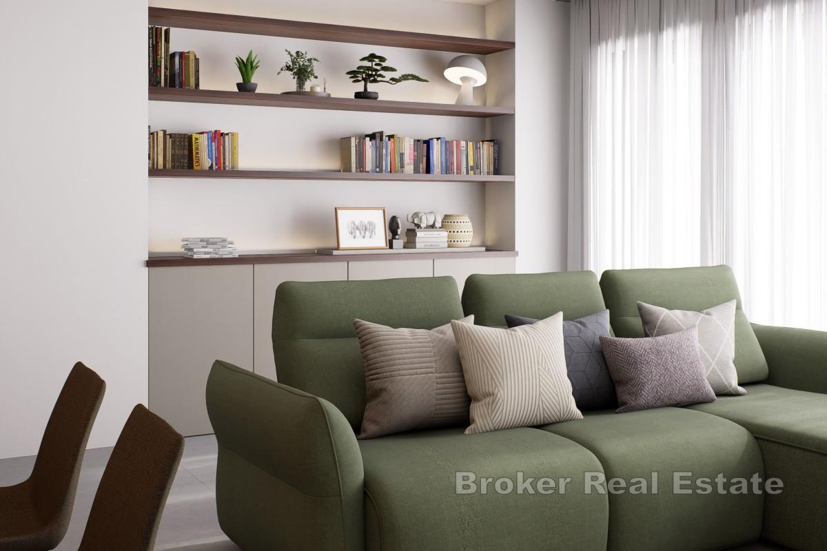 Modern lägenhet med privat trädgård